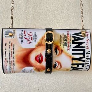Fun Marilyn Monroe convertible “Vanity Fair” magazine purse on gold chain.